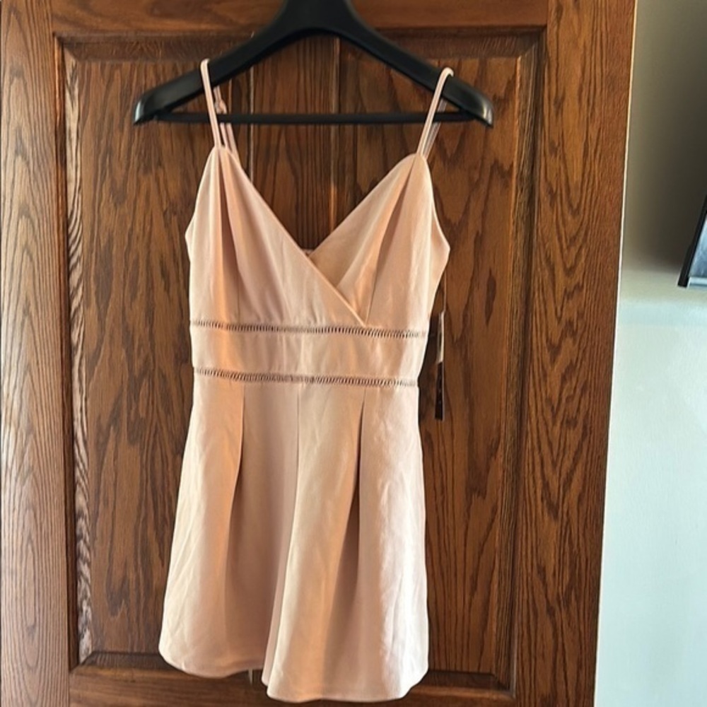 TRIXXI Clothing Company peach lined back tip adjustable strap pocket romper